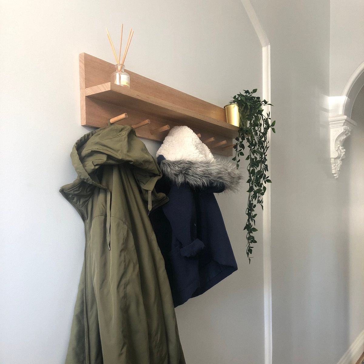 All-In-One Coat Rack Entryway Organiser Shelf. This item is 80cm with Tasmanian Oak Wood and Raw Finish.