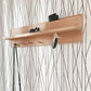 Entryway Shelf with mail holder, coat pegs and magnetic key holders on a wall. Left Side view.