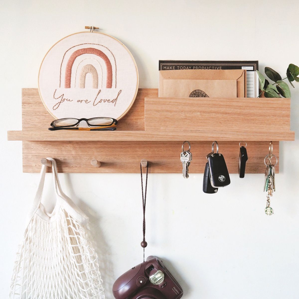 A 55cm Tasmanian Oak Entryway Shelf with mail holder, coat pegs and magnetic key holders