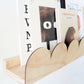 A close up look of our arch or scallop bookshelf