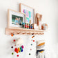 Charming Tasmanian Oak kids' wall mount coat rack and nursery shelf in a delightful bedroom setting, adding organized elegance to the space with Australian timber craftsmanship