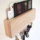 This is a wall-mounted mail and magnetic key holder for the entryway. Can be personalised for a great gift
