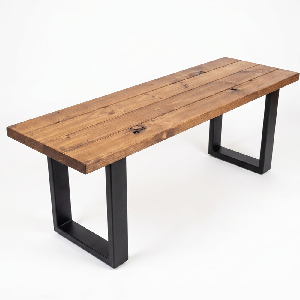Wooden bench with black metal legs on a white background